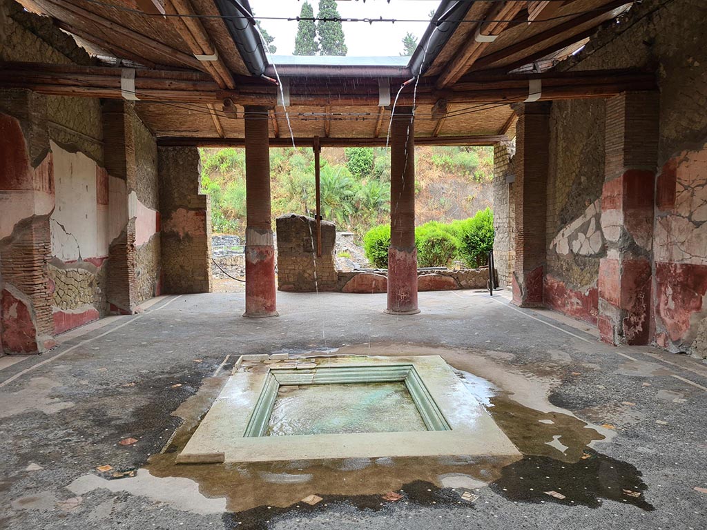Ins. Orientalis I.1, Herculaneum, June 2025. Looking east across atrium, with restored (and working) impluvium. Photo courtesy of Klaus Heese.